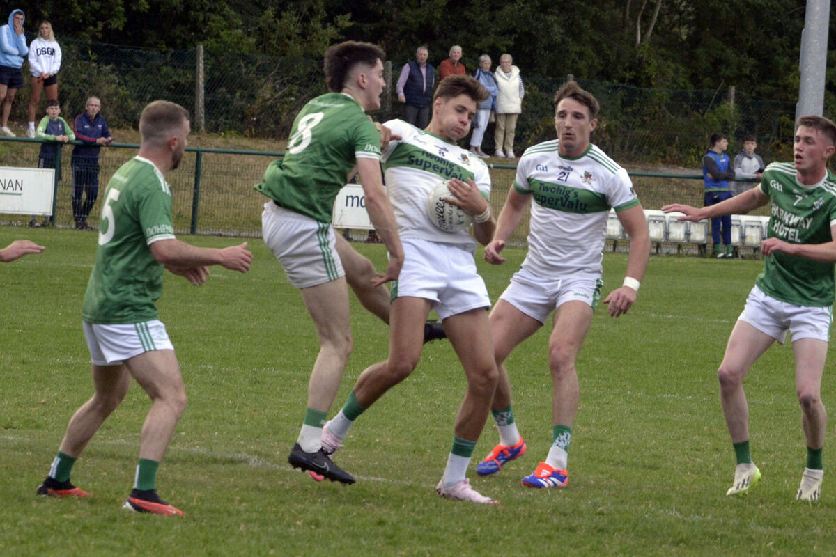 Kanturk's Alan Walsh battles Dohenys' Adam O'Donovan. Picture: Denis Boyle Kanturk's Alan Walsh battles Dohenys' Adam O'Donovan. Picture: Denis Boyle