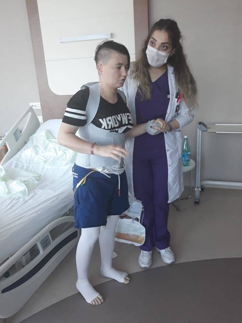 Masha Zakrevska (left) recovering after surgery for scoliosis. Masha Zakrevska (left) recovering after surgery for scoliosis.