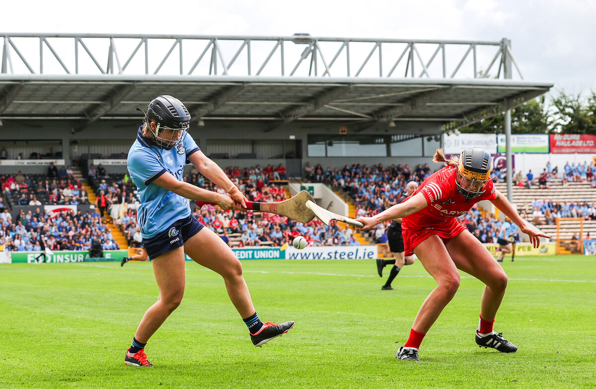 Dublin's Zoe Couch clears from Aoife Healy of Cork. Picture: INPHO/Bryan Keane Dublin's Zoe Couch clears from Aoife Healy of Cork. Picture: INPHO/Bryan Keane