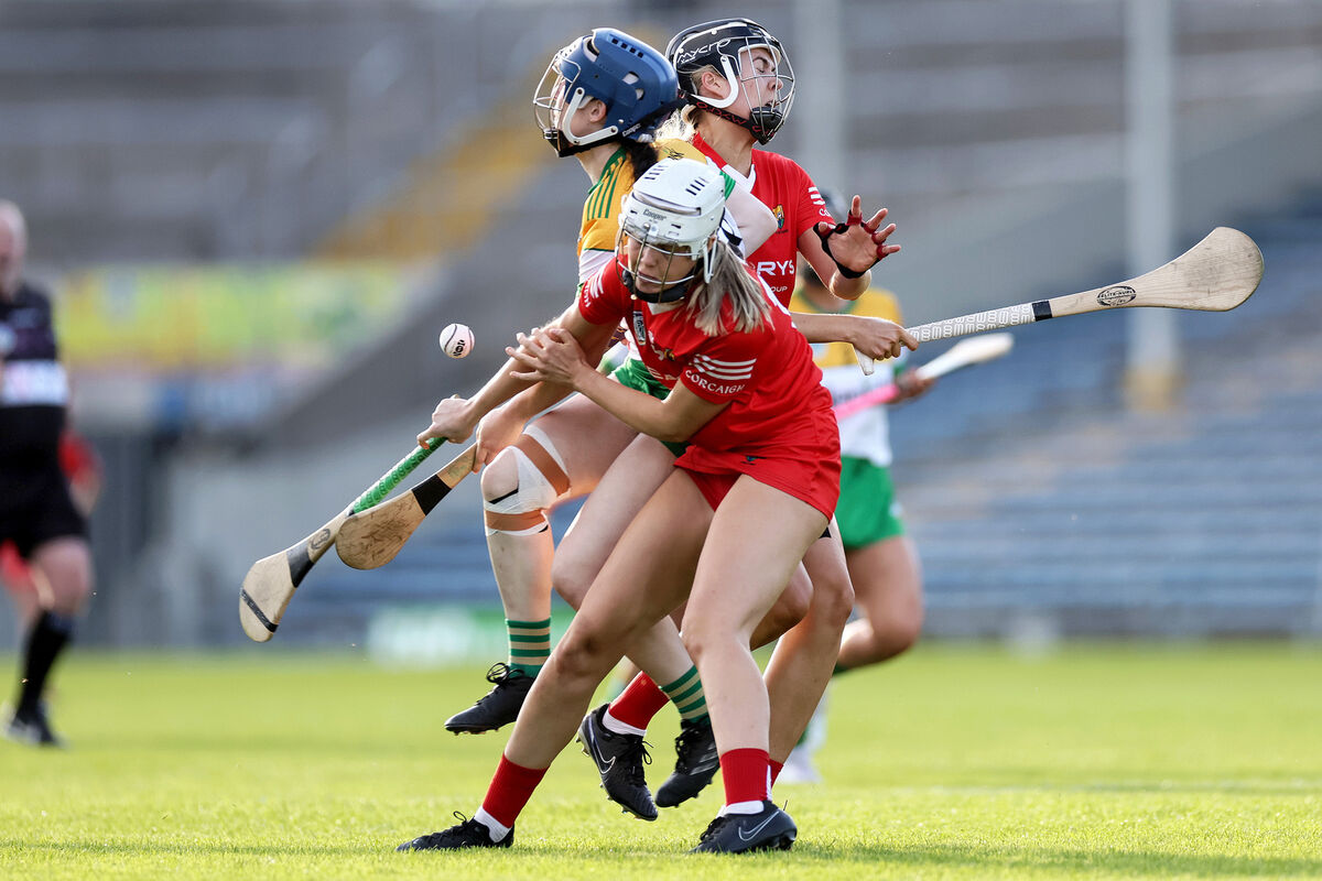 Offaly's Cathy Fogarty under pressure from Niamh O’Regan and Lucy Allen of Cork. Picture: INPHO/Laszlo Geczo