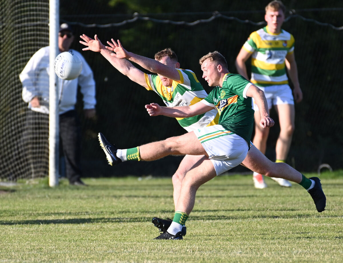 St Michael's Keith Hegarty shoots against Carbery Rangers' Patrick Hurley at Brinny. Picture: Eddie O'Hare