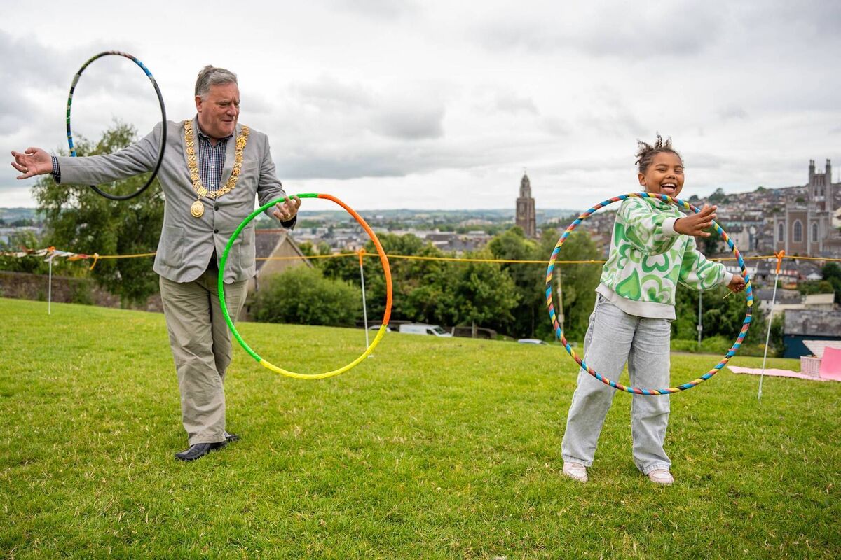 Lord Mayor Dan Boyle taking a lesson in Hula Hooping from Lene Bandoba at the Lets Play Cork event.  Picture by Noel Sweeney