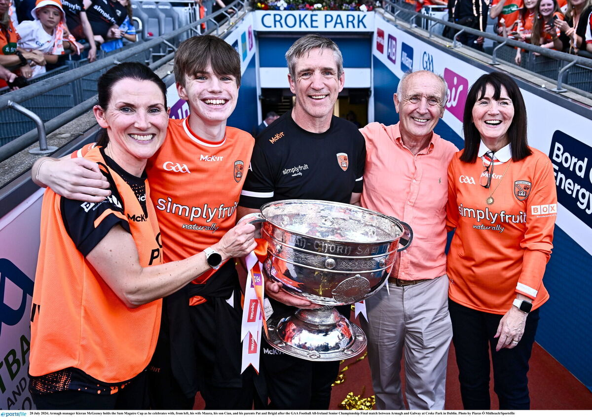 McGeeney celebrates with his wife Maura, his son Cian, and his parents Pat and Brigid. Picture: Piaras Ó Mídheach/Sportsfile