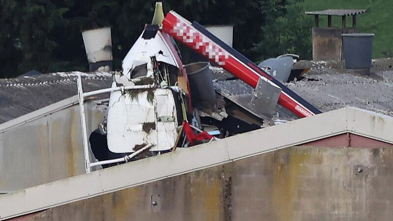 Two people confirmed dead after helicopter crashes into farm building