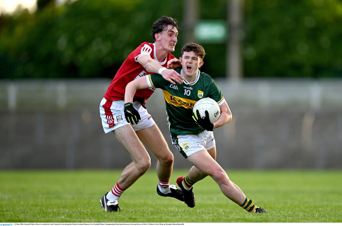 Kerry's Gearóid White is tackled by Jack Trench of Cork during the Munster MFC final this year. Picture: Brendan Moran/Sportsfile