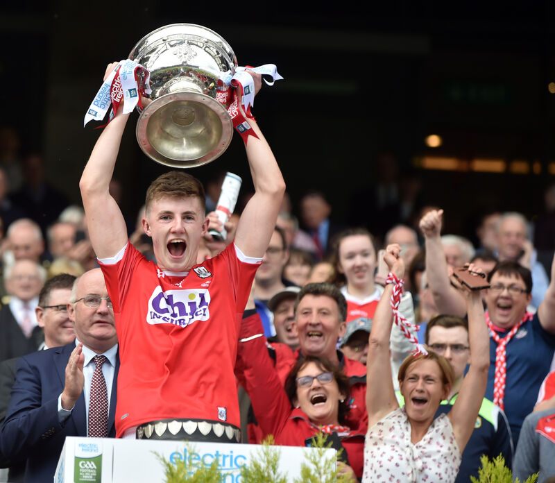 Cork captain Conor Corbett raises the Tom Markham Cup after defeating Galway in the All-Ireland MFC final in 2019. Picture: Eddie O'Hare