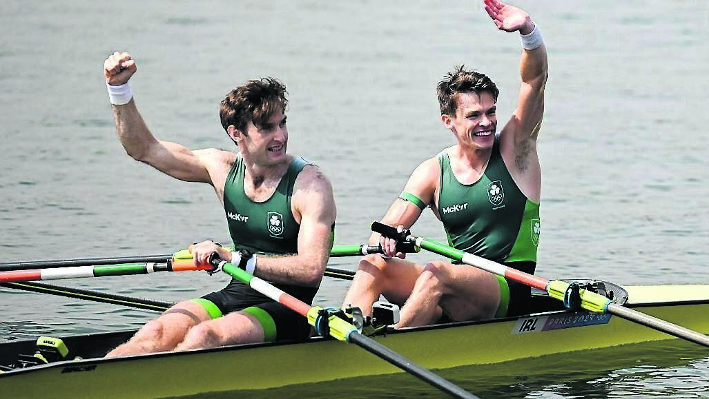 Paul O'Donovan, left, and Fintan McCarthy of Team Ireland celebrate winning the men's lightweight double sculls finals A at Vaires-sur-Marne Nautical Stadium during the 2024 Paris Summer Olympic Games in Paris, France. Photo by Brendan Moran/Sportsfile