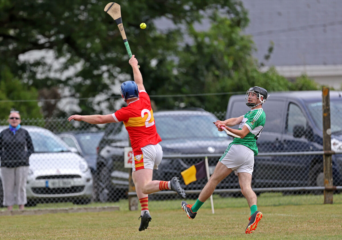 Brian Corcoran, Éire Óg, cannot stop the shot of James Lane, Aghabullogue. Picture: Jim Coughlan. Brian Corcoran, Éire Óg, cannot stop the shot of James Lane, Aghabullogue. Picture: Jim Coughlan.