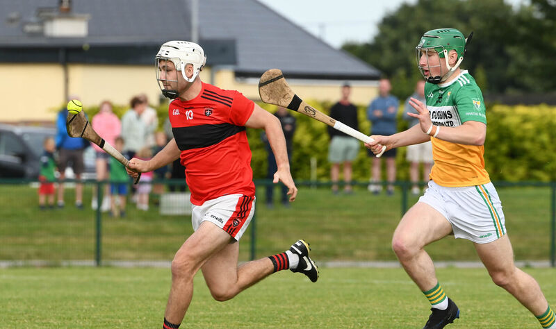 Cloyne's Brian Walsh pulls away from Bride Rovers' Josh Ahern. Picture: Howard Crowdy