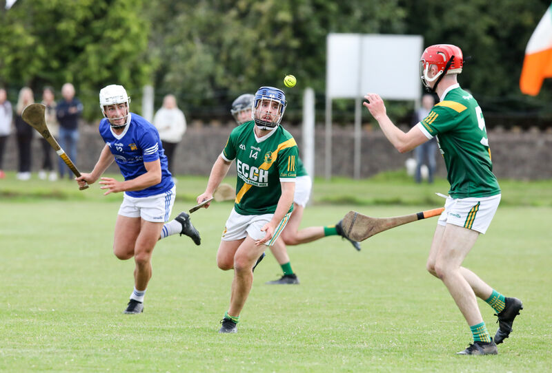 Dungourney's James McCarthy passes the ball to teammate Mike Leahy against Ballinhassig. Picture: David Creedon Dungourney's James McCarthy passes the ball to teammate Mike Leahy against Ballinhassig. Picture: David Creedon