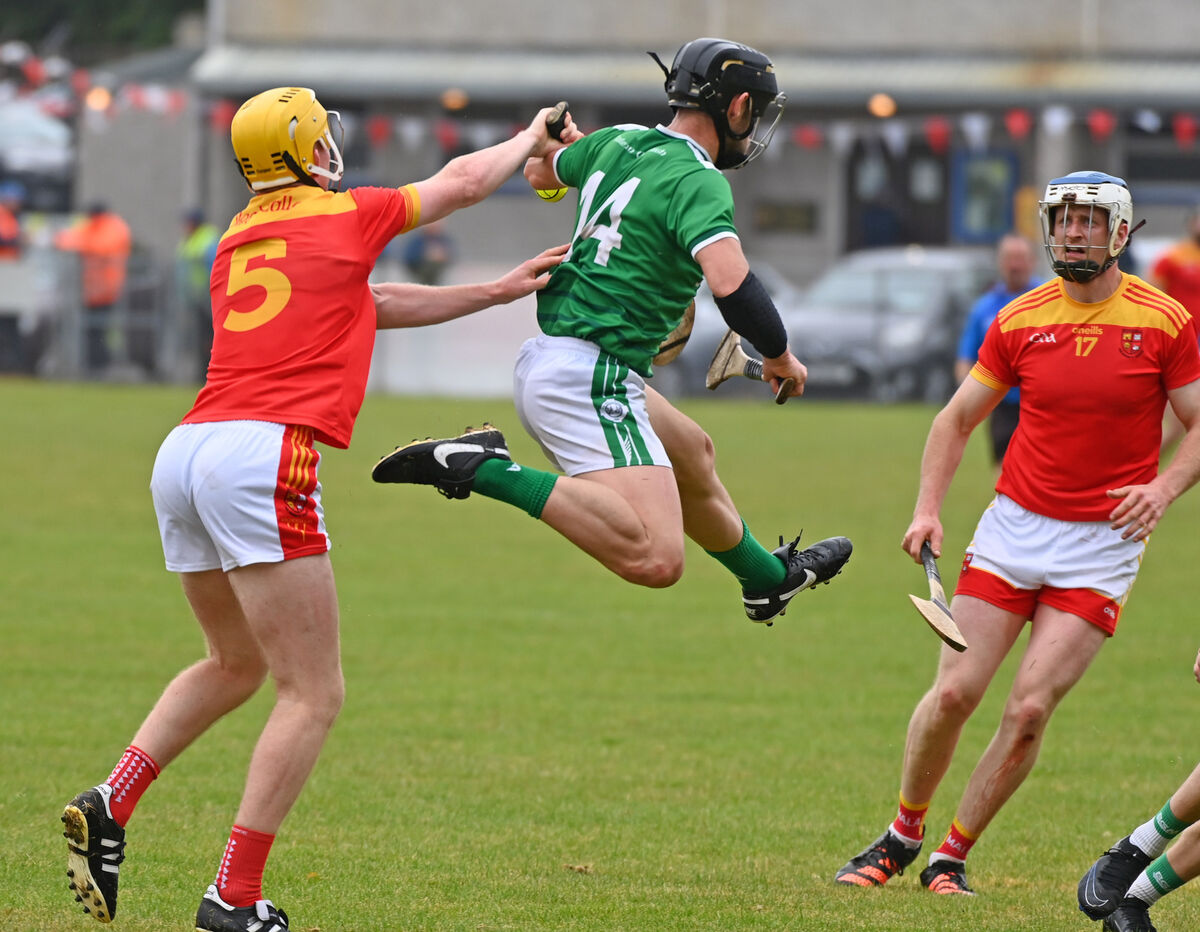 Ballincollig's Pearse Morris flying through the air with Mallow's Bill Kingston during the Co-Op SuperStores PIHC at Ballyanly. Picture: Eddie O'Hare Ballincollig's Pearse Morris flying through the air with Mallow's Bill Kingston during the Co-Op SuperStores PIHC at Ballyanly. Picture: Eddie O'Hare