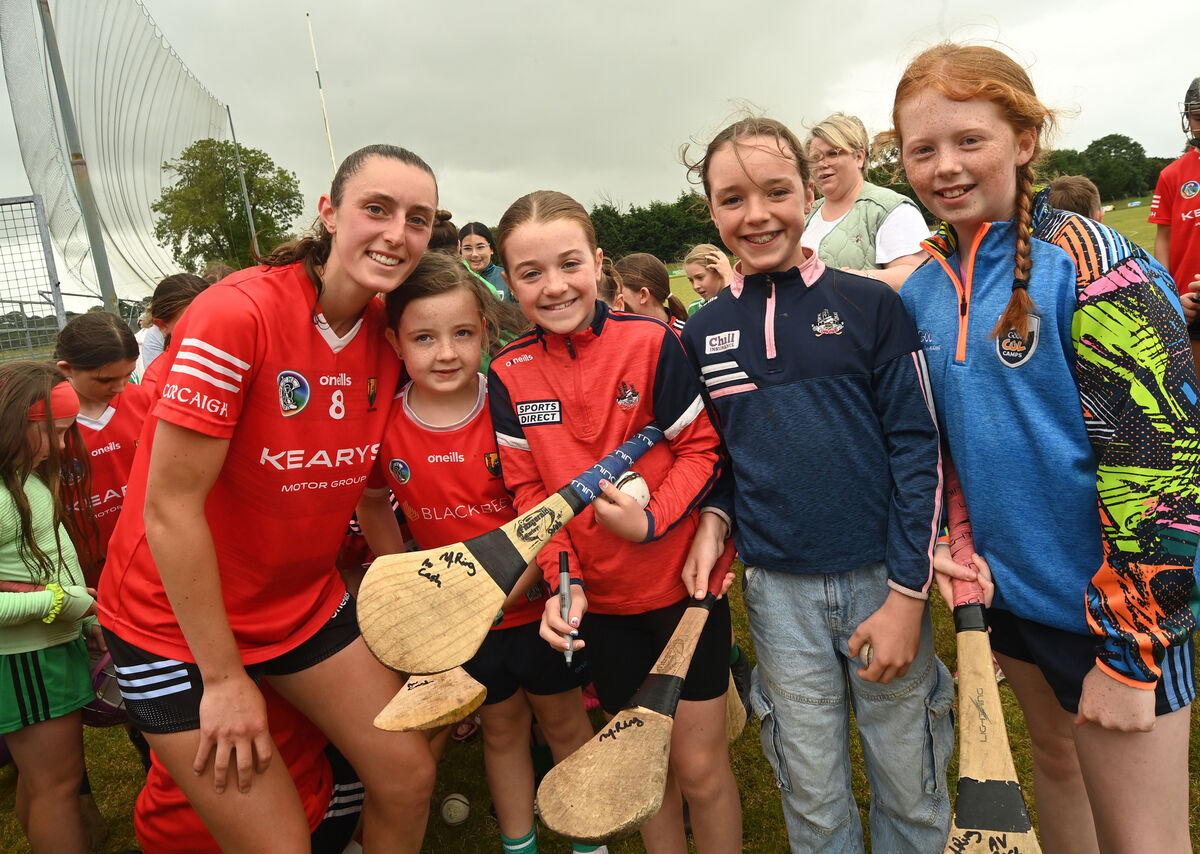  Cork Intermediate camogie player Avril Cashman (Youghal) with young players at Aghabullogue GAA Club at Coachford, for a meet and greet session with the Cork intermediate camogie team on Saturday August 3.rd 2024. Pic Larry Cummins