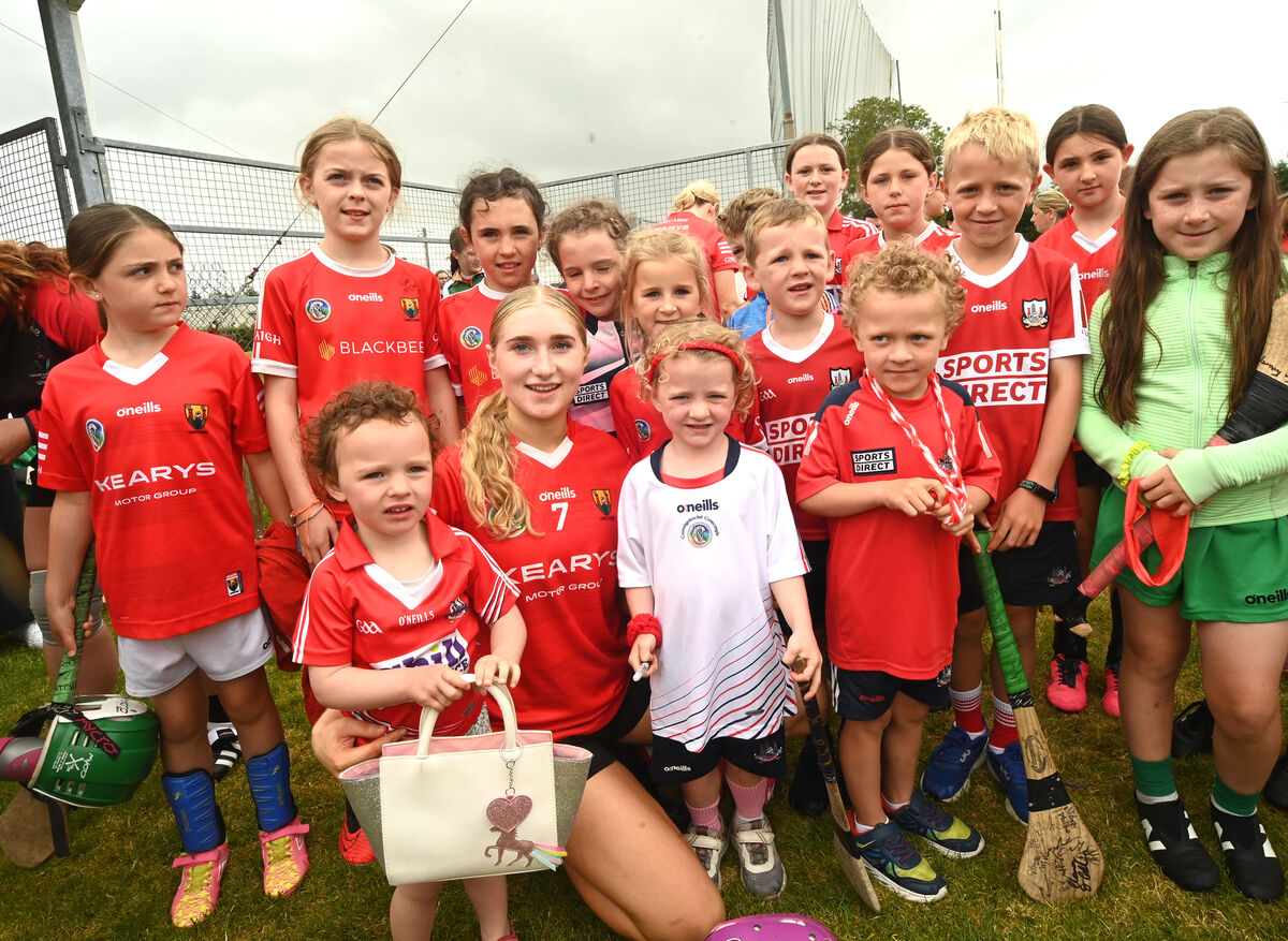  Cork and Aghabullogue player Meadhbh Ring with young supporters at Coachford, during the meet and greet session with the Cork intermediate camogie team on Saturday August 3.rd 2024. Pic Larry Cummins