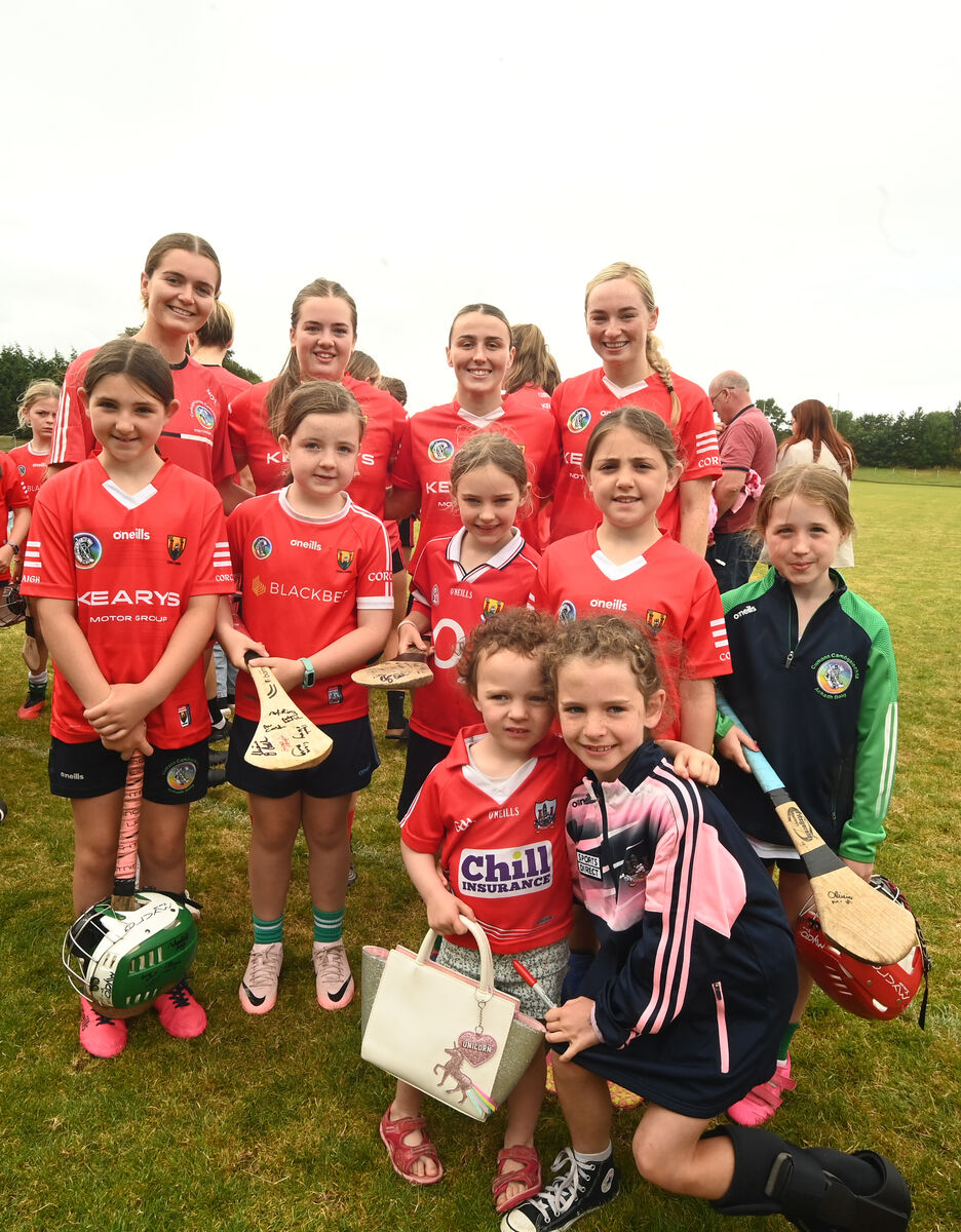  Cork players Niamh O'Leary, Ciara Hurley, Lauren Homan (captain) and Cliona O'Callaghan with young supporters at Aghabullogue GAA Club at Coachford, during the meet and greet session with the Cork intermediate camogie team on Saturday August 3.rd 2024. Pic Larry Cummins