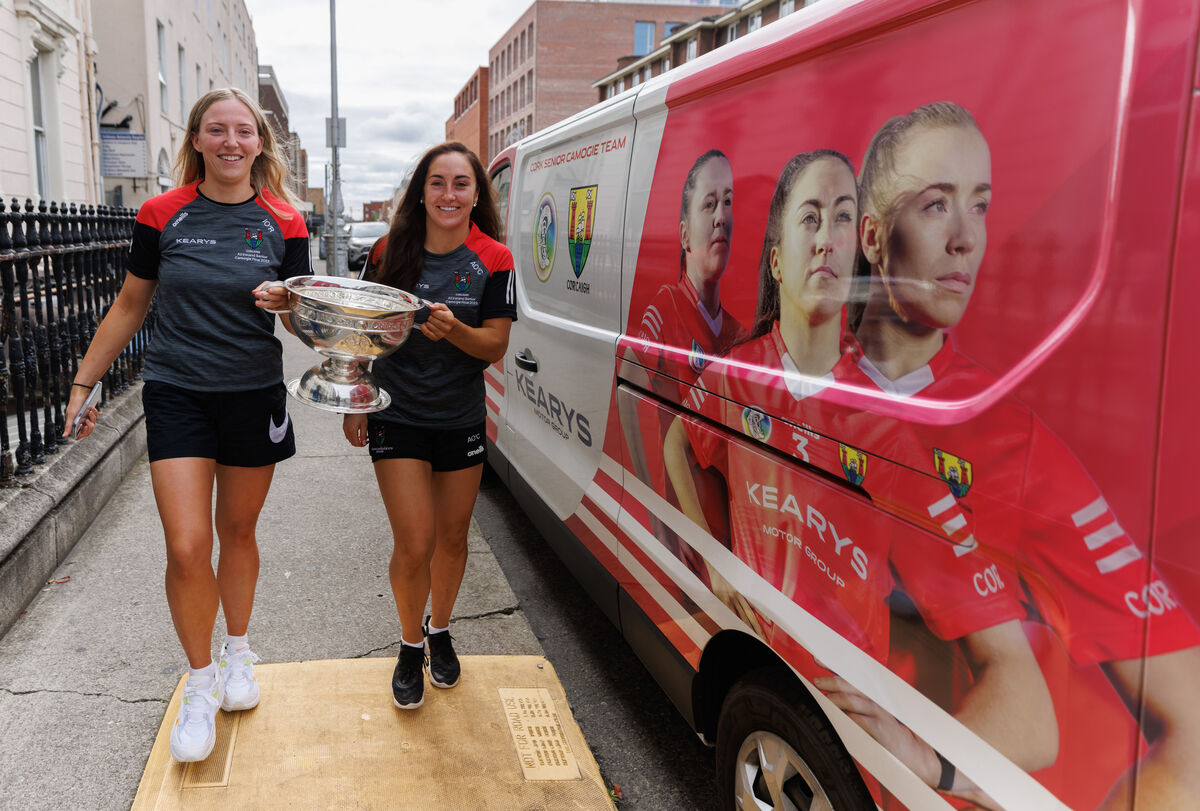 Cork’s Izzy O'Regan and Amy O'Connor at Temple Street Hospital with the cup after last year's final. Picture: James Crombie