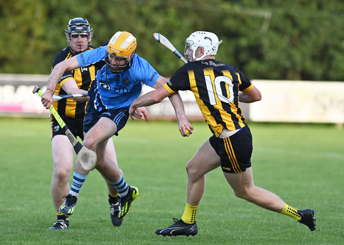 David Murphy of Barryroe tries to get past Kilbrittain’s Ross Cashman and Ronan Crowley in Friday night's Premier JHC game at Clonakilty. Picture: Martin Walsh
