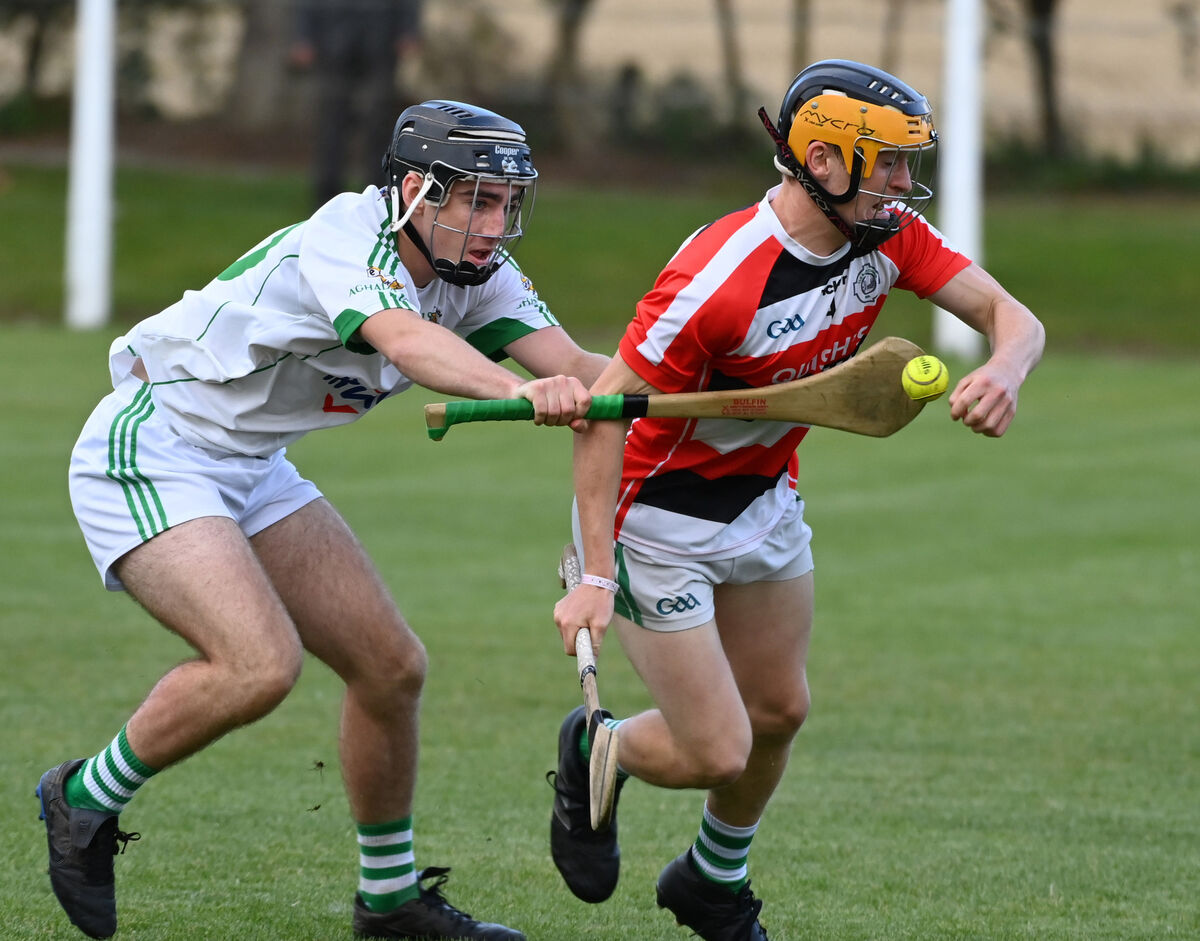 Aghada's Tomás Condon flicks the sliothar away from Ballincolig's Jack Murphy. Picture: Eddie O'Hare  Aghada's Tomás Condon flicks the sliothar away from Ballincolig's Jack Murphy. Picture: Eddie O'Hare
