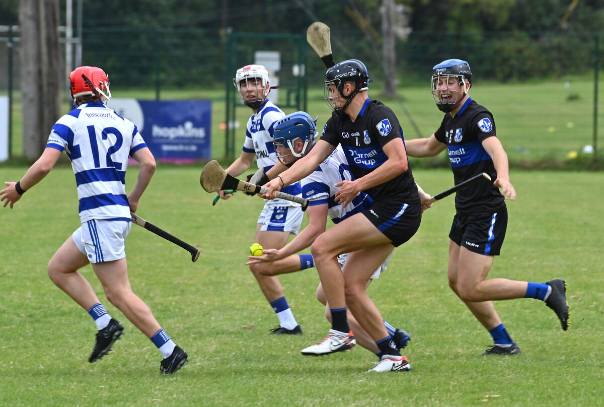  Sarsfields' player Harry Cogan tackles Conor O'Sullivan of Inniscarra. Picture: Dan Linehan