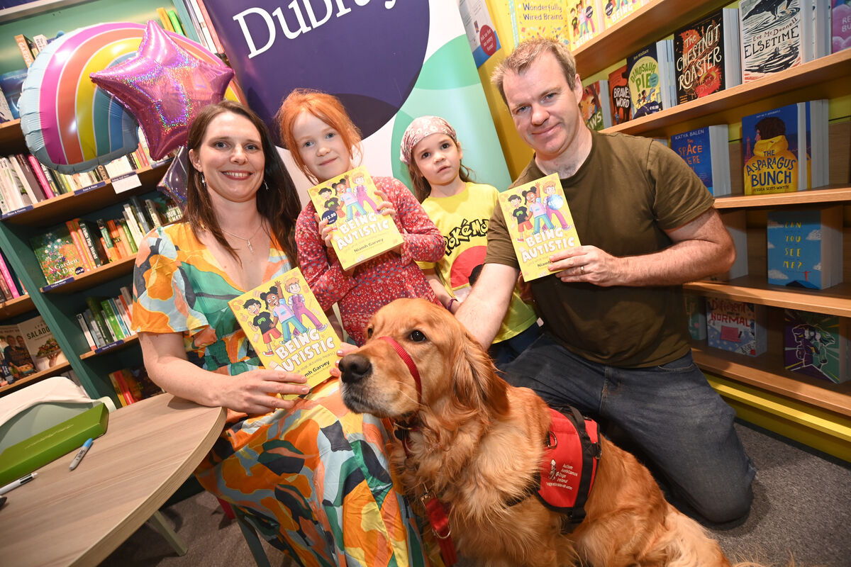  Book author Niamh Garvey with Céilín, Ornaith and Brendan Quigley and autism assistance dog Matisse at the book launch. Picture: Larry Cummins