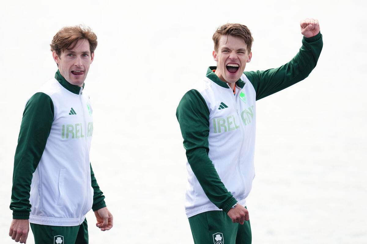 Ireland's Fintan McCarthy and Paul O'Donovan celebrate winning gold during the ceremony for the Rowing Lightweight Men's Double Sculls Final at the Vaires-sur-Marne Nautical Stadium on the seventh day of the 2024 Paris Olympic Games in France. Ireland's Fintan McCarthy and Paul O'Donovan celebrate winning gold during the ceremony for the Rowing Lightweight Men's Double Sculls Final at the Vaires-sur-Marne Nautical Stadium on the seventh day of the 2024 Paris Olympic Games in France.