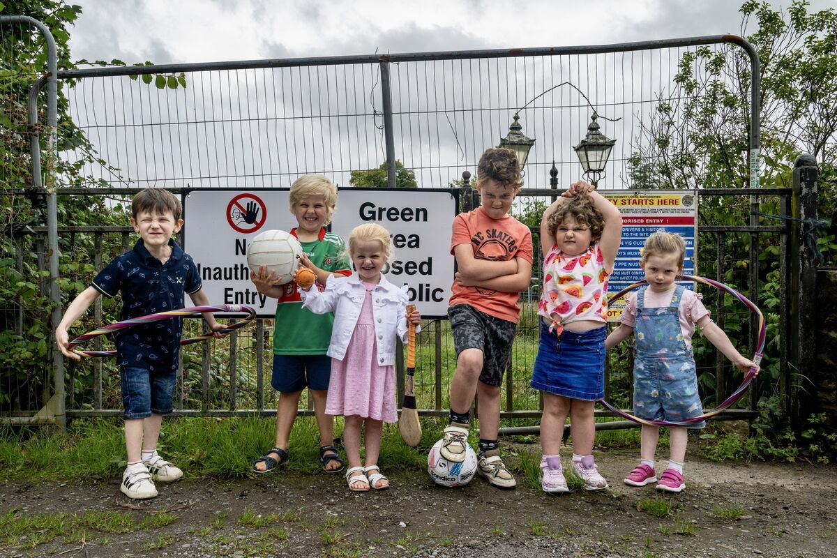 Ronan Landers, Donnacha Drumey, Aoibhín Drumey, Adam Moloney, Lila Drumey and Fiadh Landers, pictured in a lane outside the newly named 'Uisce Eireann Park' in Shannonvale Cork. Picture: Chani Anderson. Ronan Landers, Donnacha Drumey, Aoibhín Drumey, Adam Moloney, Lila Drumey and Fiadh Landers, pictured in a lane outside the newly named 'Uisce Eireann Park' in Shannonvale Cork. Picture: Chani Anderson.