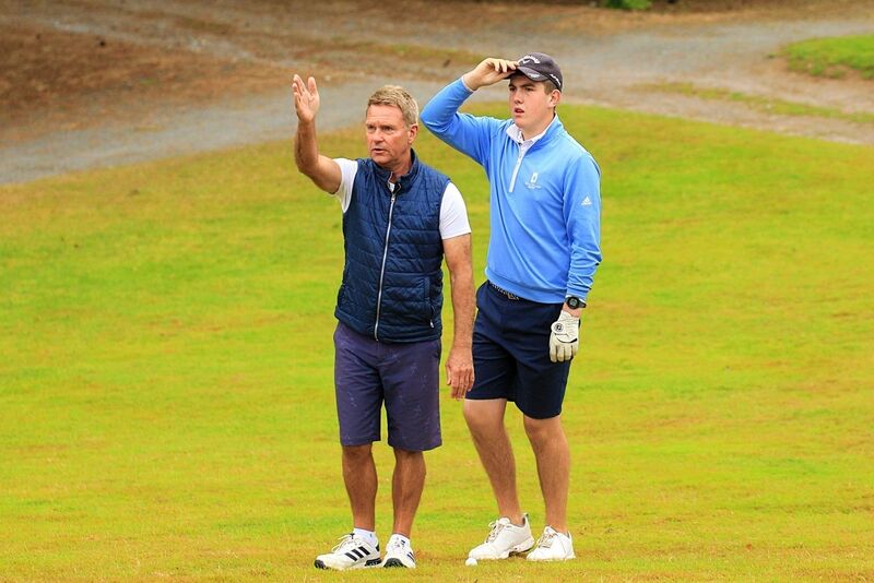 Fota Island's Aaron Olden and caddie Donal Cronin weigh up their options during the semi-final of the Ryan's SuperValu Junior Scrstch Trophy at Muskerry Golf Club. Picture: Niall O'Shea Fota Island's Aaron Olden and caddie Donal Cronin weigh up their options during the semi-final of the Ryan's SuperValu Junior Scrstch Trophy at Muskerry Golf Club. Picture: Niall O'Shea