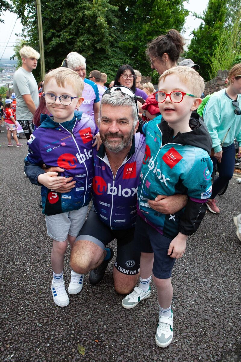 Cyclist Tom Moynihan from Cobh pictured with twins Cillian and Connor Keane, aged 9, from Tipperary at the end of the 2024 Tour de Munster Charity Cycle on Patricks Hill, Cork City on Sunday, August 11th. Pic: Diane Cusack Cyclist Tom Moynihan from Cobh pictured with twins Cillian and Connor Keane, aged 9, from Tipperary at the end of the 2024 Tour de Munster Charity Cycle on Patricks Hill, Cork City on Sunday, August 11th. Pic: Diane Cusack