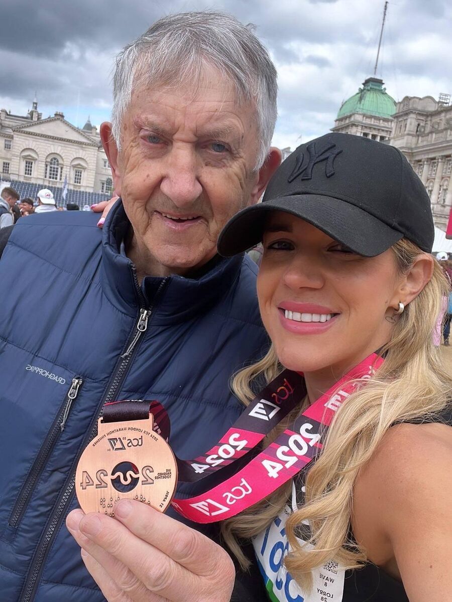 Brenda with her dad, who was also a marathon runner. Brenda with her dad, who was also a marathon runner.