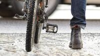 Bike in traffic, winter