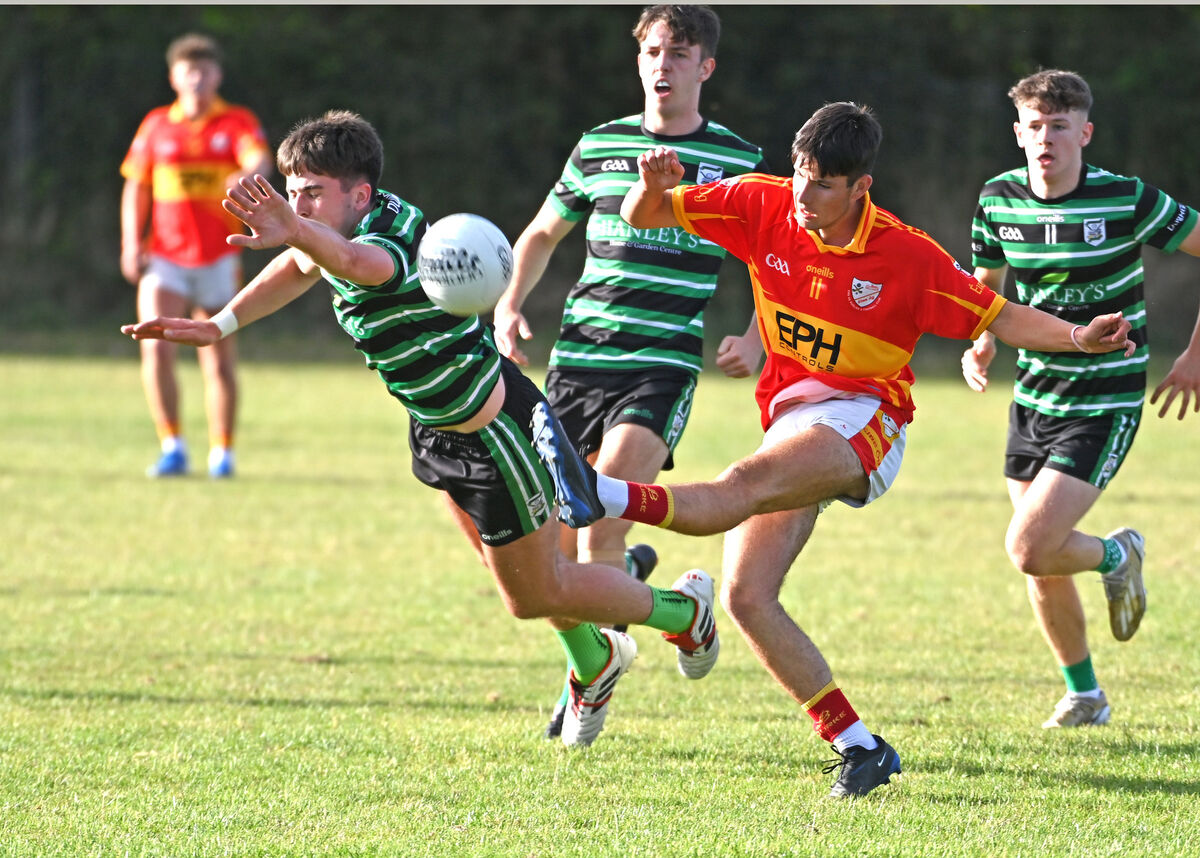 Eire Og's Sean Murphy shoots past Douglas' Cathal Hallahan during the P1MFC at Ovens. Picture: Eddie O'Hare