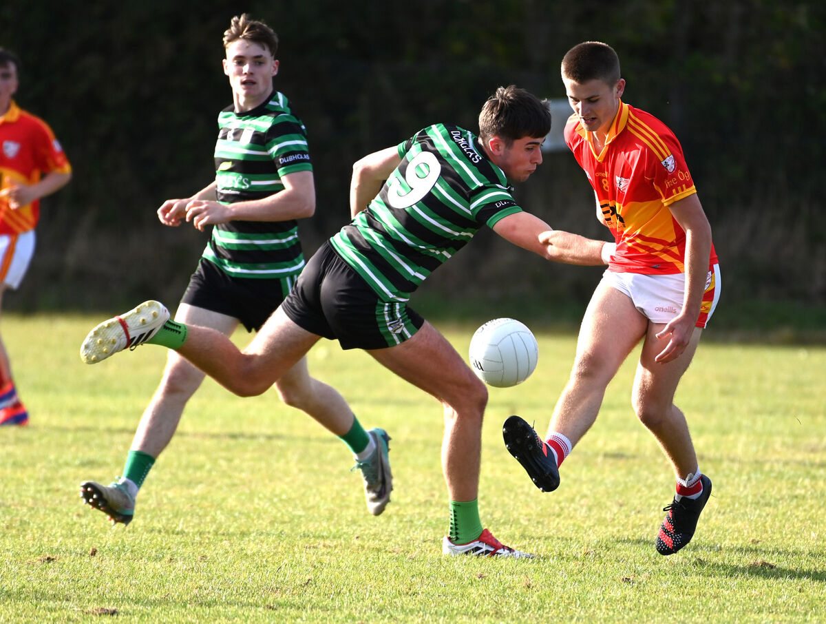 Eire Og's Kevin Beechinor goes past Douglas' Cathal Hallahan during the P1MFC at Ovens. Picture: Eddie O'Hare
