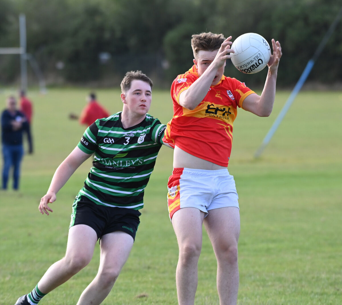 Eire Og's Jack O'Connell wins the ball from Douglas' Brian O'Hehir during the P1MFC at Ovens. Picture: Eddie O'Hare