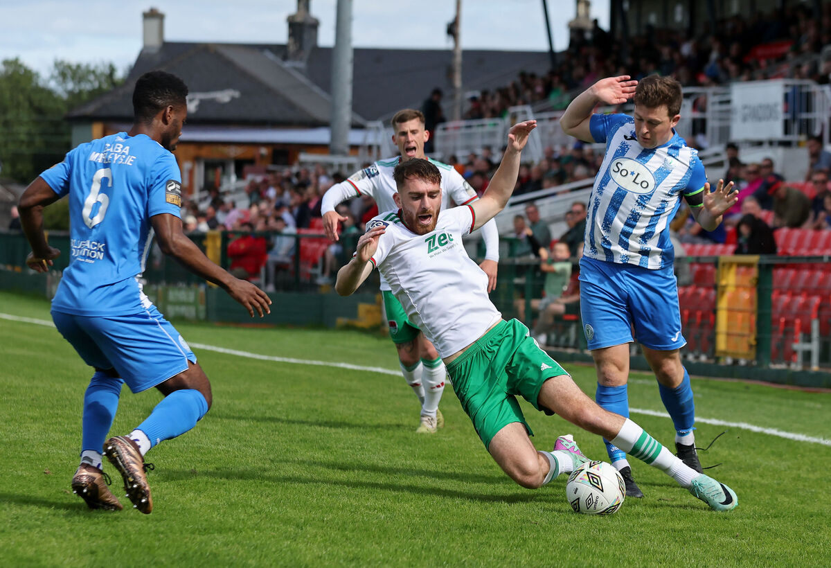  Conor Drinan, Cork City FC, is tackled by Tony McNamee, Finn Harps. Picture: Jim Coughlan.