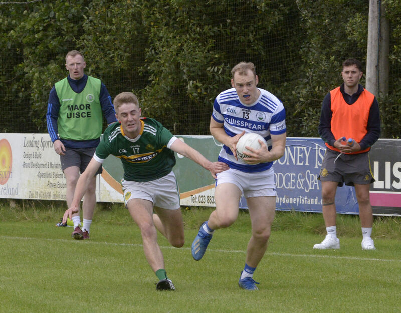  Castlehaven's Cathal Maguire moves away from Tom Grainger of St Michael's. Picture: Denis Boyle