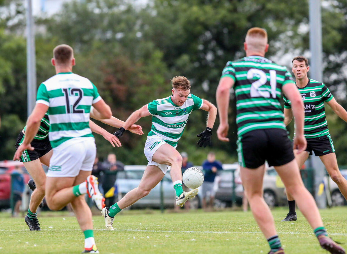 Valley Rovers player Johnny Kiely solo's up field. Picture: David Creedon