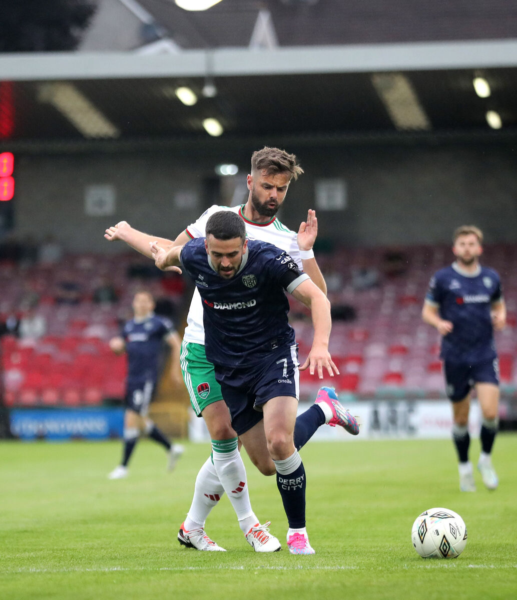 Cork City's Greg Bolger tackles Michael Duffy of Derry. Picture: INPHO/Bryan Keane