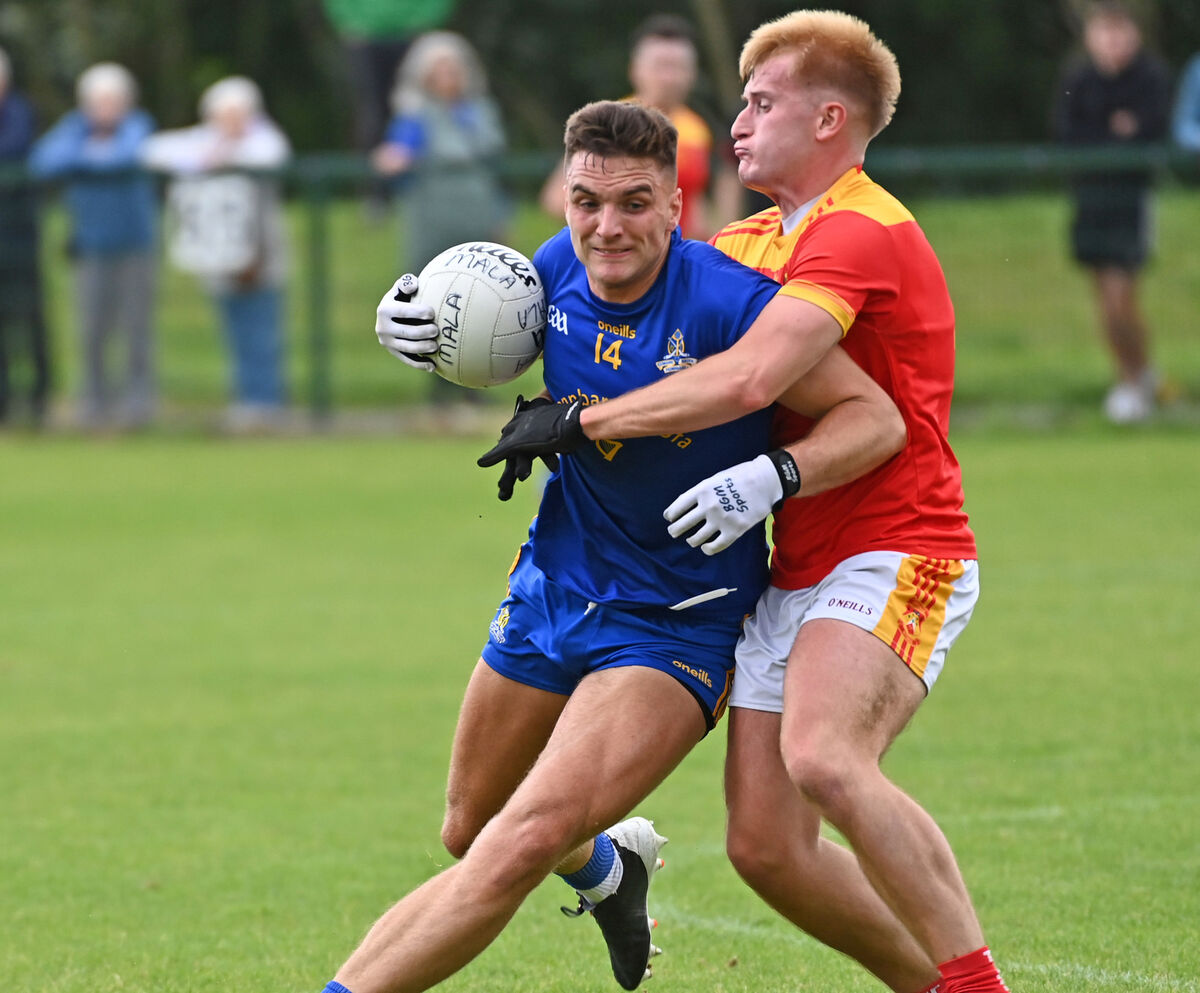 St Finbarr's Brian Hayes is tackled by Mallow's Eoghan Barry during the McCarthy Insurance Group Cork Premier SFC at Grenagh. Picture: Eddie O'Hare