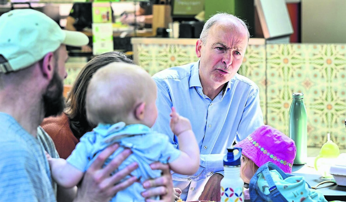 Baby Rory O’Callaghan makes a point to Micheál Martin while the Tánaiste canvassed with Billy Kelleher, Mary Rose Desmond , and David Boyle in the Douglas Court Shopping Centre during the local and European elections earlier this year. The former Taoiseach is believed to be a shoo-in to retain his South-Central seat come the next general election, whenever that is.	 Picture Chani Anderson
                    
