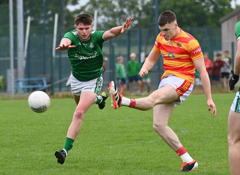  Newcestown's David Buckley gets a shot away Conor Dalton of Ballincollig tries to close him down. Picture: Eddie O'Hare