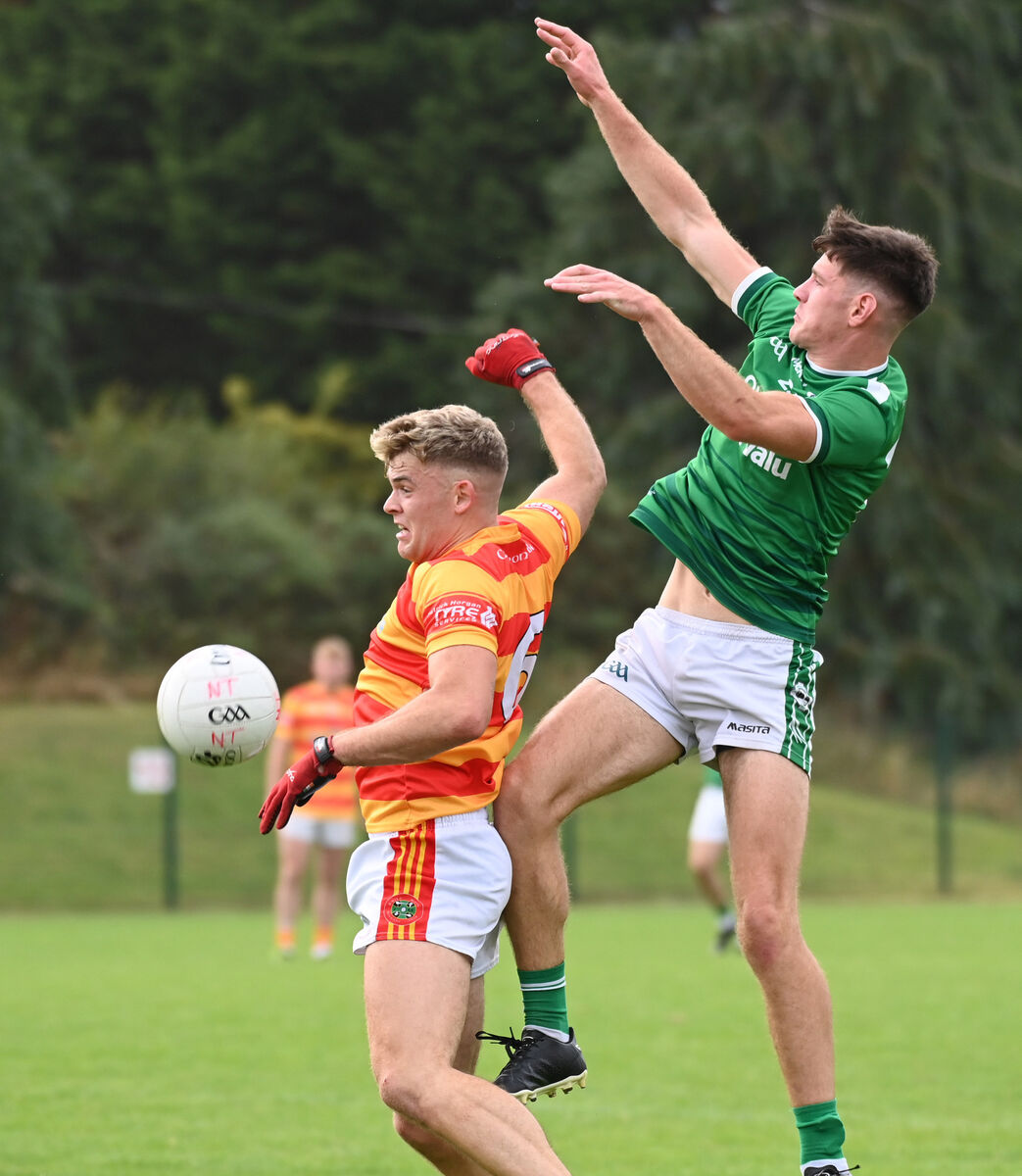  Ballincollig's Seán Dore and Newcestown's Gearóid O'Donovan battle for possession in the air. Picture: Eddie O'Hare