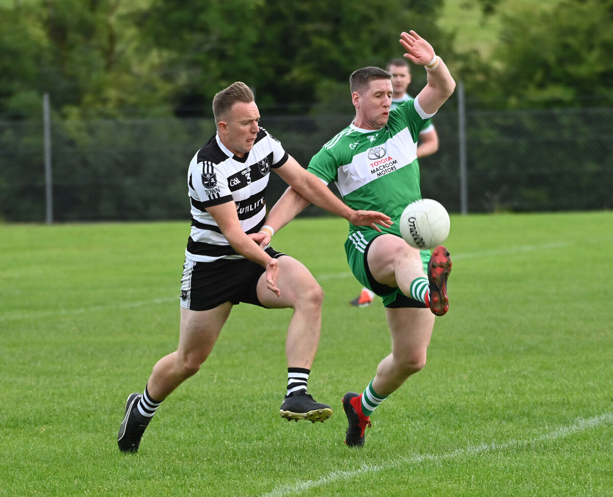 Macroom's Eoin O'Mahony knocks the ball away from Castletownbere's Declan Dunne during the McCarthy Insurance Group Cork Premier IFC at Aughaville. Picture: Eddie O'Hare