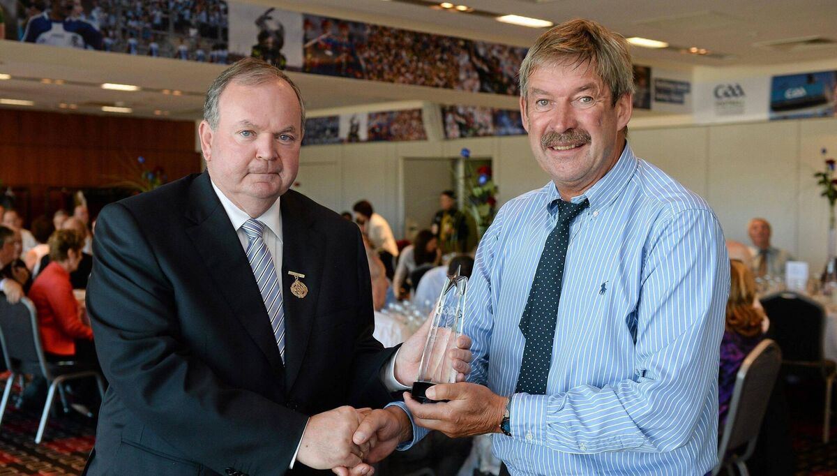 GAA chairman Liam O'Neill presents Kevin Kehily with his 'Stars of the 80s' award before the All-Ireland SFC final between Dublin and Mayo in 2013. Picture: Ray McManus/ Sportsfile