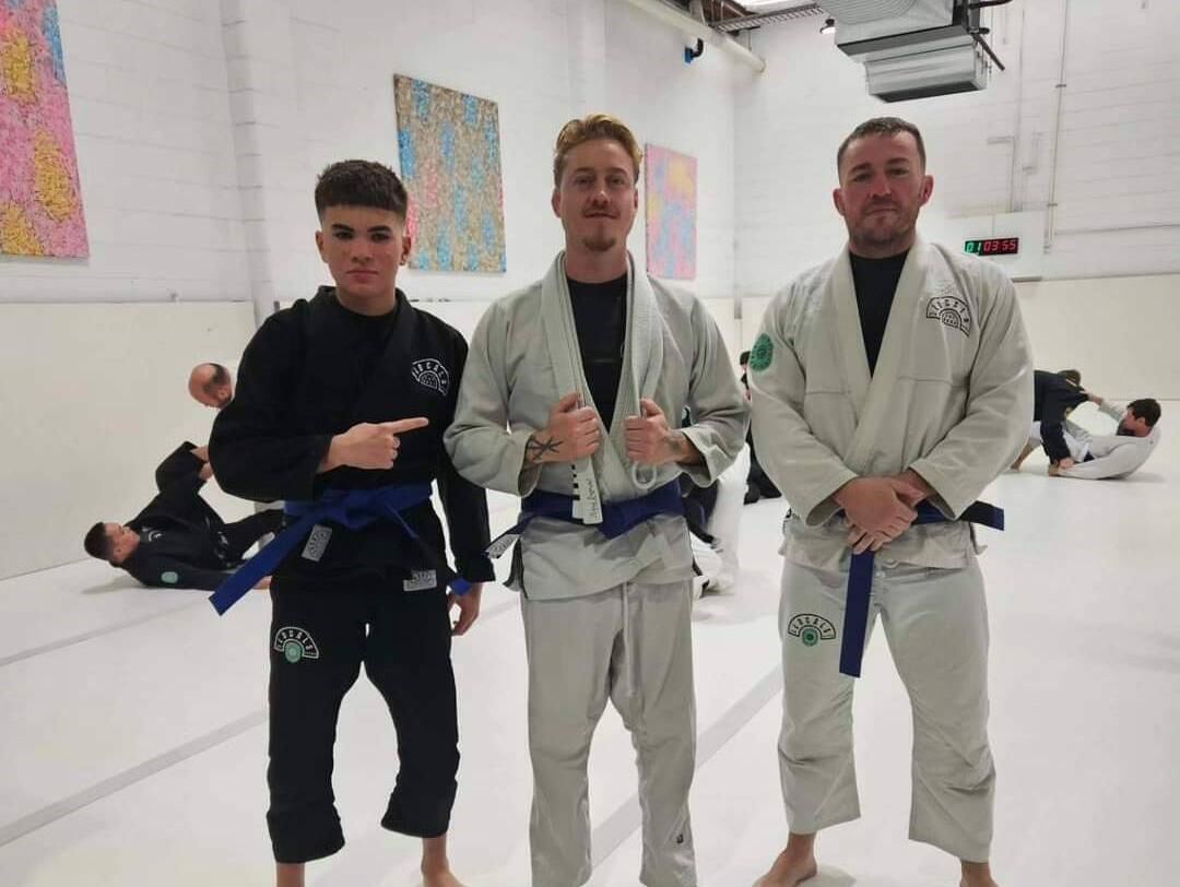 Paul, far right, took up jiu-jitsu when living in Australia. Pictured with Daniel Damasco and Maykie van der Meerye. Paul, far right, took up jiu-jitsu when living in Australia. Pictured with Daniel Damasco and Maykie van der Meerye.
