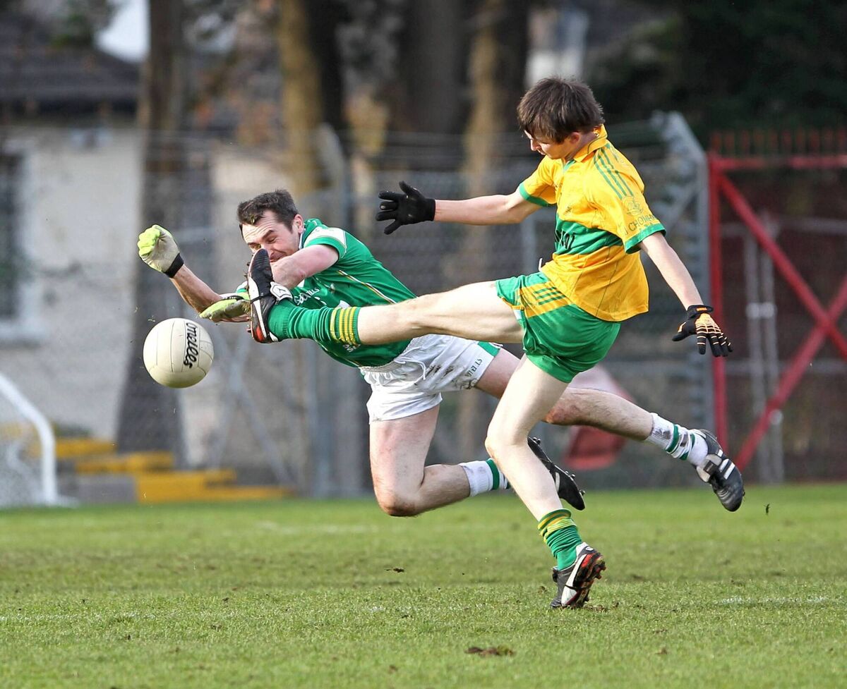 Kevin Goulding, St Vincent's, blocks the shot of Tom Downes, O'Curry's, in 2012. Picture: Jim Coughlan. Kevin Goulding, St Vincent's, blocks the shot of Tom Downes, O'Curry's, in 2012. Picture: Jim Coughlan.