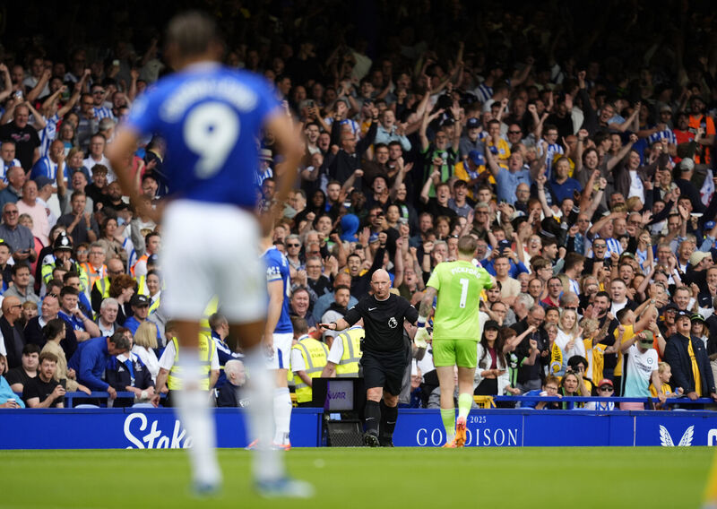 Referee Simon Hooper overturns a penalty decision after a VAR check during the Premier League match at Goodison Park, Liverpool. Picture: Nick Potts/PA Wire