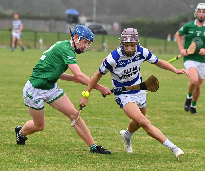 Inniscarra's Donagh Holland and Killeagh's Tadhg Considine race onto the sliotar. Picture: Eddie O'Hare