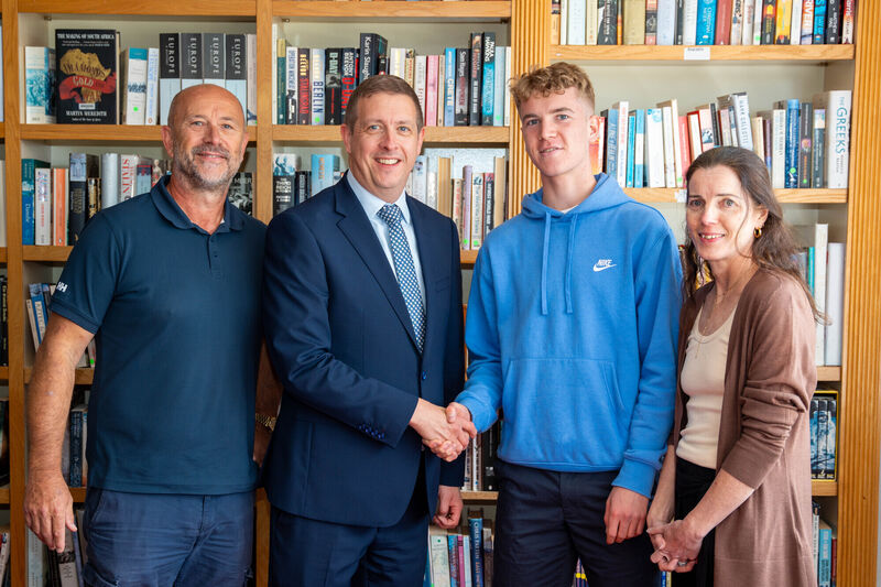 Luca Bonnet from Christian Brothers College in Cork city photographed in the school library with his father David Bonnet, CBC principal David Lordon and mom Carol O'Leary, after achieving 8 H1s in this year's Leaving Certificate. Picture: Noel Sweeney