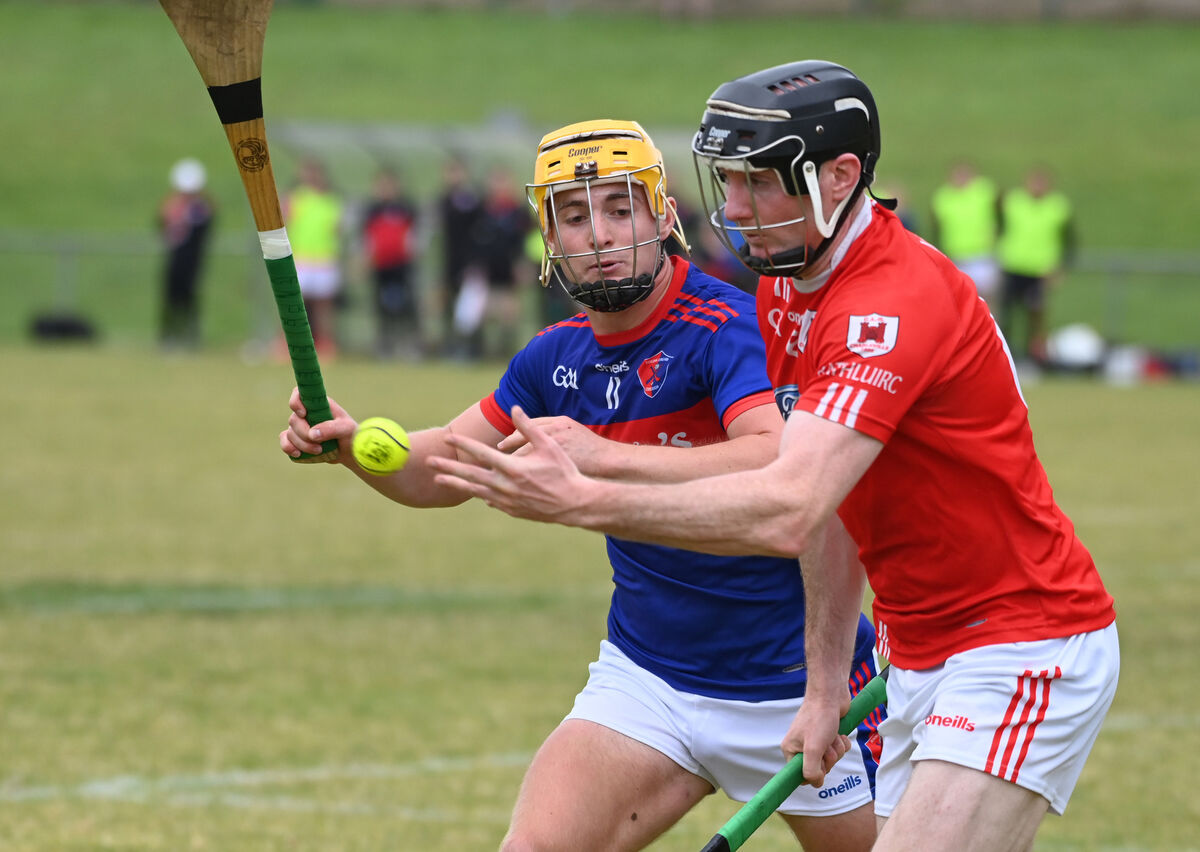 Charleville's Alan Dennehy tries to gather possession as Erin's Own's Matt O'Riordan closes in. Picture: Eddie O'Hare Charleville's Alan Dennehy tries to gather possession as Erin's Own's Matt O'Riordan closes in. Picture: Eddie O'Hare