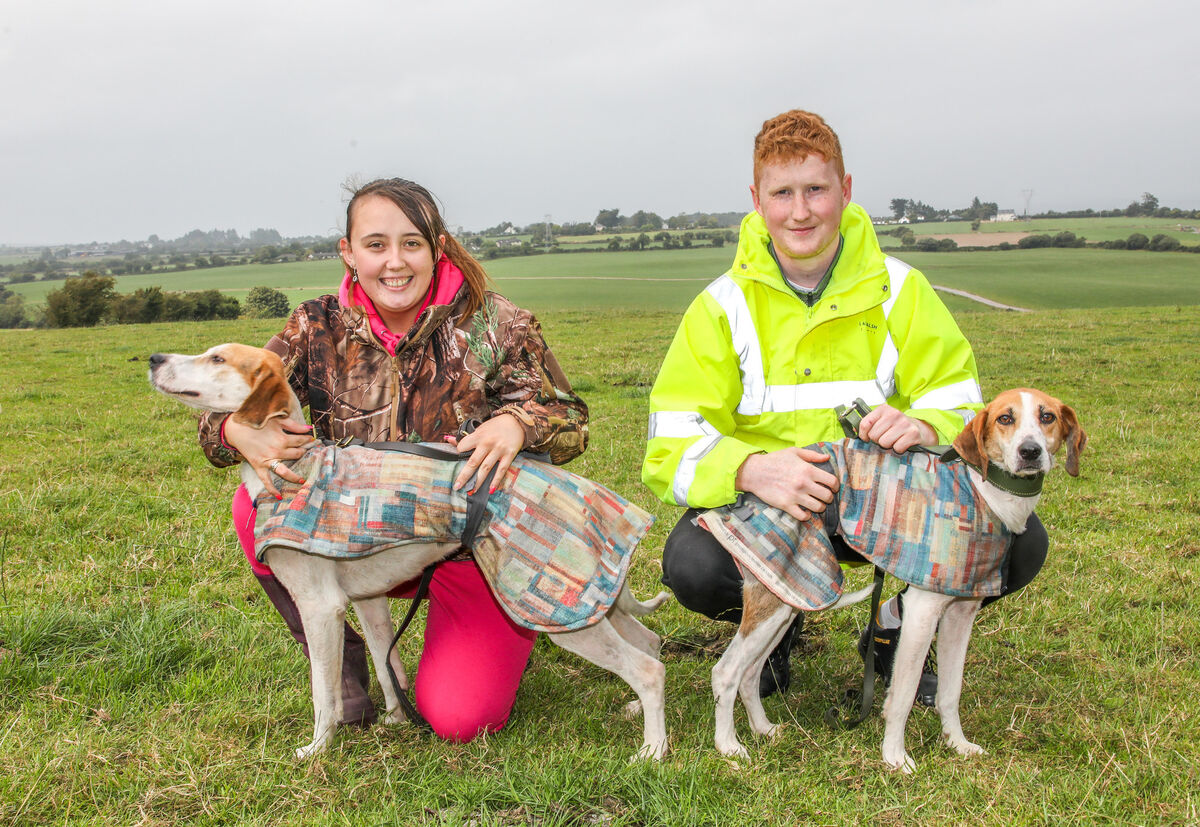 Nicole Power and Ruairí with their dogs Buddy and Sky. Picture: David Creedon