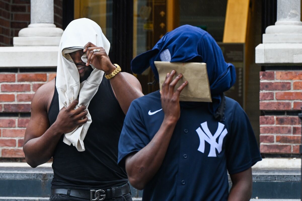 Two of the total 16 people arrested following serious public order incidents in Cork city on Sunday night pictured leaving the courthouse after their hearing on Monday. Picture Chani Anderson Two of the total 16 people arrested following serious public order incidents in Cork city on Sunday night pictured leaving the courthouse after their hearing on Monday. Picture Chani Anderson